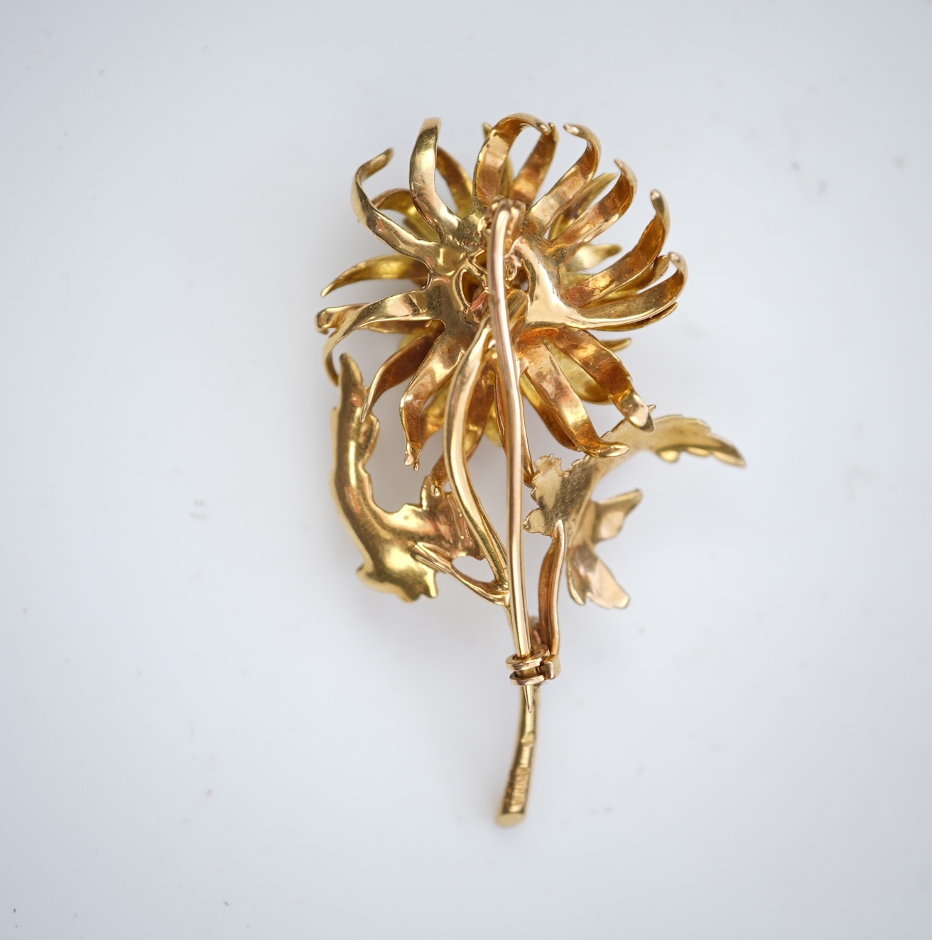 Ben Rosenfeld, a gold and ruby brooch, circa 1977